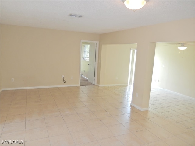 view of tiled empty room