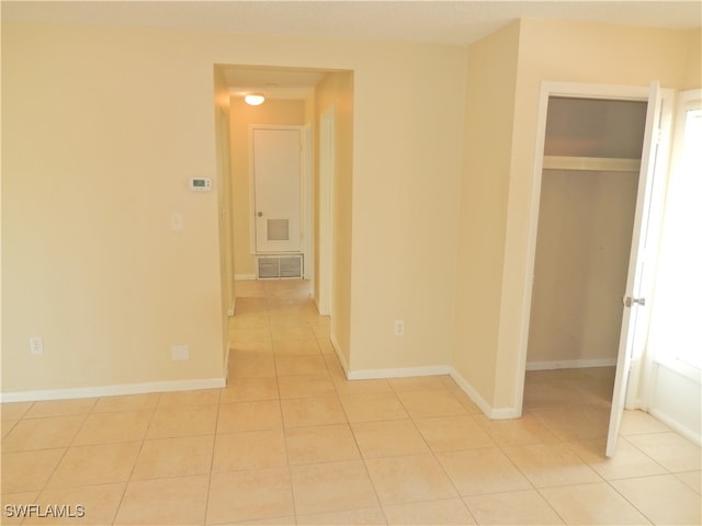 interior space featuring light tile patterned floors