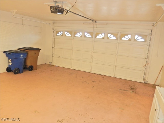 garage featuring a garage door opener