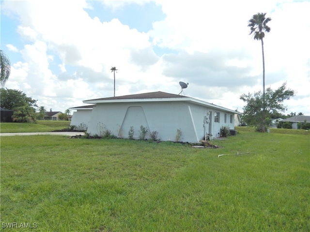 view of property exterior featuring a yard