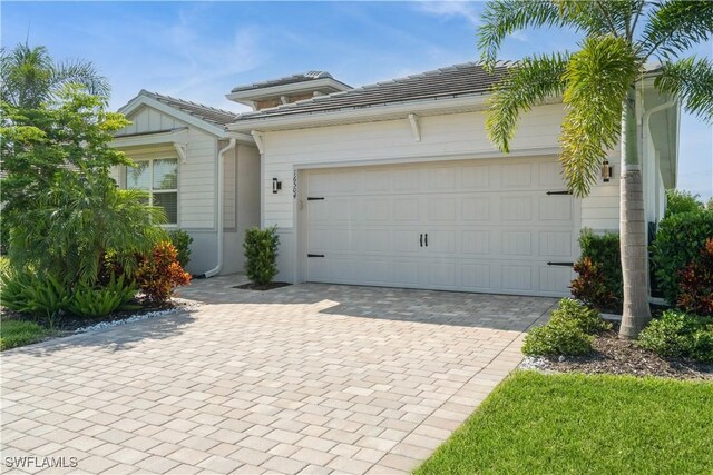 view of front of property with a garage