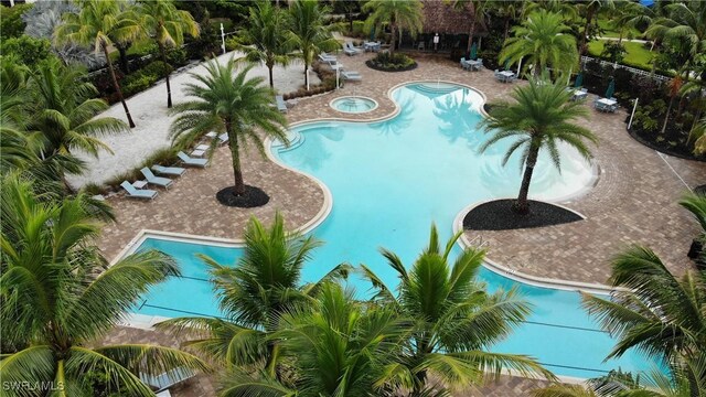 view of pool featuring a patio