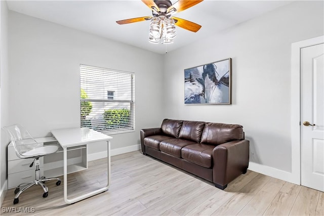 8084 Sanctuary Dr Unit 1, Naples, FL 34104 - office area featuring light wood finished floors and ceiling fan