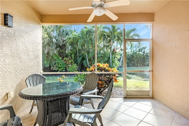 sunroom / solarium with ceiling fan