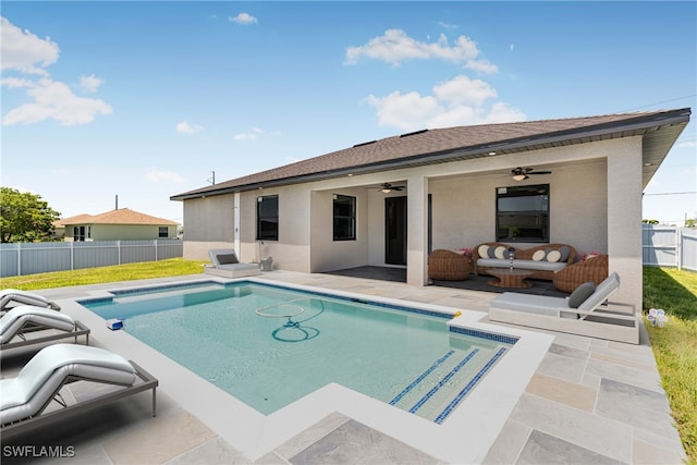 view of pool featuring a patio and ceiling fan