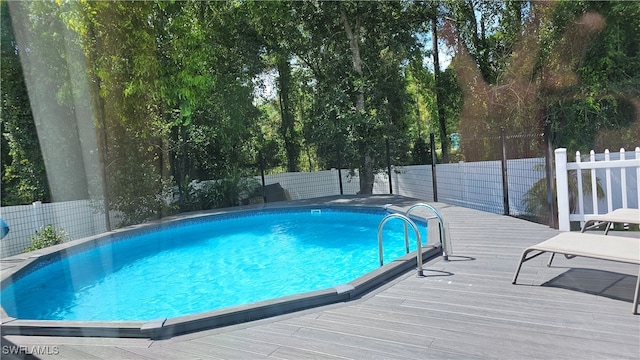 view of pool featuring a deck