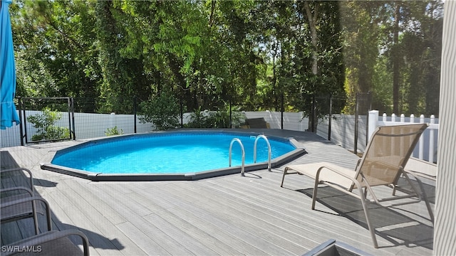 view of pool featuring a deck