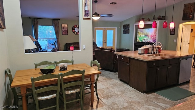 kitchen featuring pendant lighting, ceiling fan, a healthy amount of sunlight, and sink