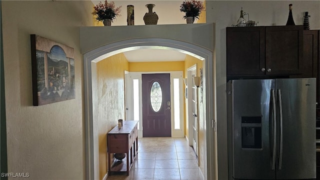 entrance foyer with light tile patterned floors