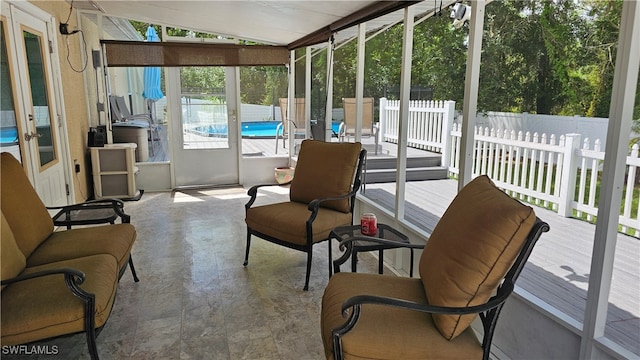 sunroom with lofted ceiling