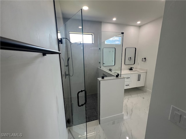 bathroom featuring tile patterned flooring, walk in shower, and dual vanity