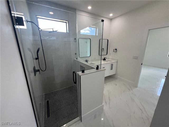 bathroom with vanity, walk in shower, and tile patterned floors