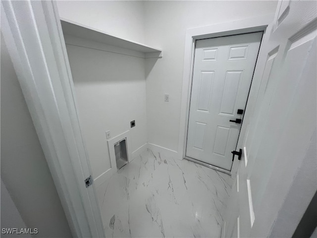 laundry room featuring light tile patterned floors and electric dryer hookup