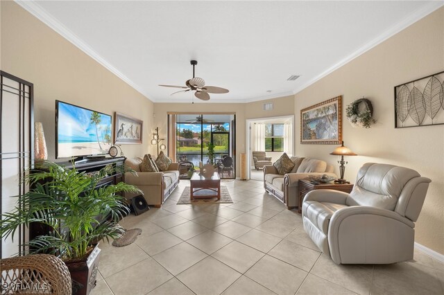 tiled living room with ceiling fan and ornamental molding