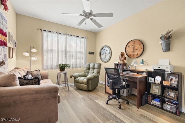 home office with ceiling fan, wood finished floors, and baseboards