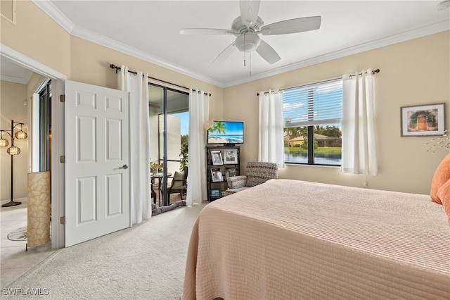 bedroom featuring access to exterior, a ceiling fan, crown molding, and light colored carpet