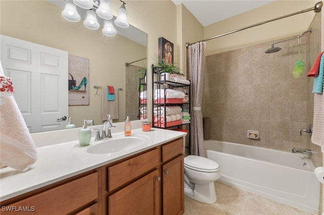 bathroom featuring toilet, vanity, shower / tub combo with curtain, and tile patterned floors