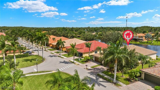 birds eye view of property with a residential view