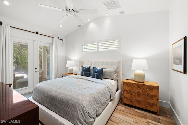 bedroom featuring access to exterior, ceiling fan, french doors, light hardwood / wood-style flooring, and vaulted ceiling