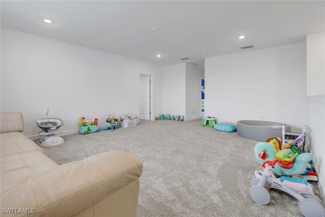 rec room featuring carpet flooring