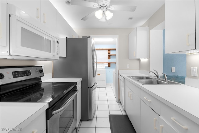 kitchen with white cabinetry, sink, ceiling fan, and white appliances