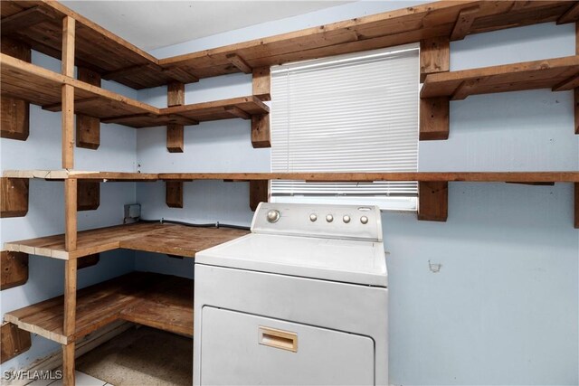 1418 Shirley Dr, North Fort Myers, FL 33917 - laundry area with washer / dryer and laundry area