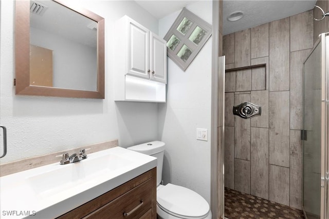 1418 Shirley Dr, North Fort Myers, FL 33917 - full bathroom featuring toilet, a shower stall, visible vents, and vanity