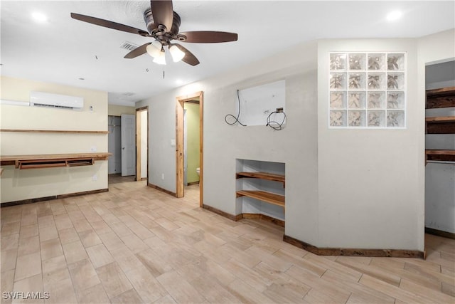 1418 Shirley Dr, North Fort Myers, FL 33917 - interior space featuring visible vents, baseboards, a ceiling fan, a wall unit AC, and light wood-type flooring