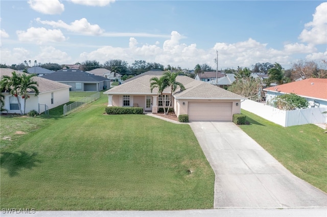 single story home with a front yard and a garage