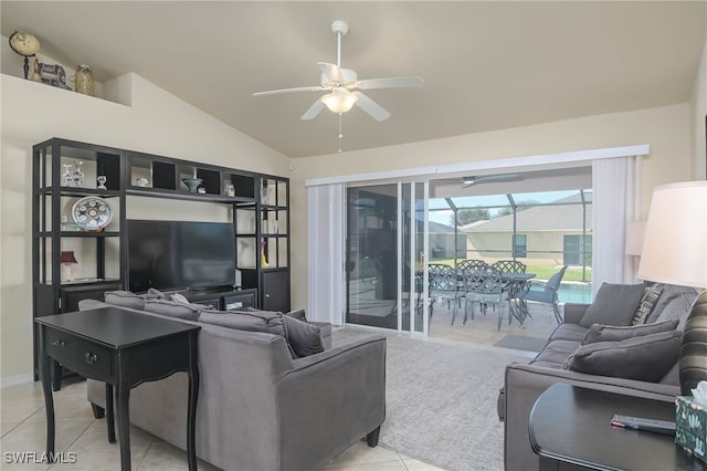 tiled living room with lofted ceiling and ceiling fan