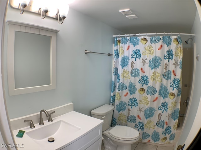 full bathroom with tile patterned flooring, shower / bath combination with curtain, vanity, and toilet