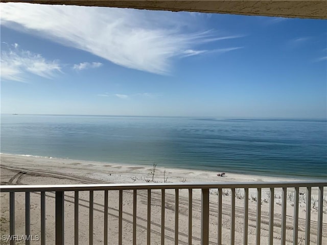 view of water feature with a beach view