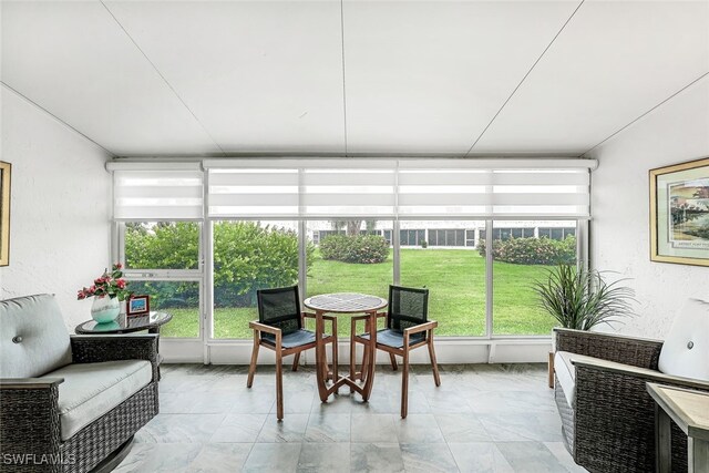 sunroom / solarium with a healthy amount of sunlight