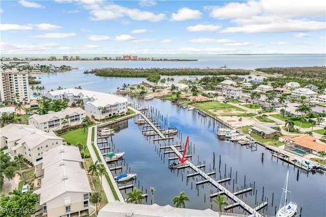 bird's eye view with a water view