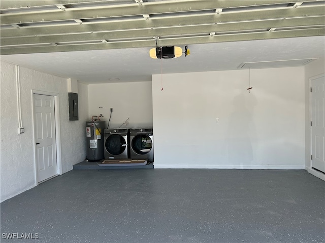 garage featuring washer and dryer, a garage door opener, electric water heater, and electric panel