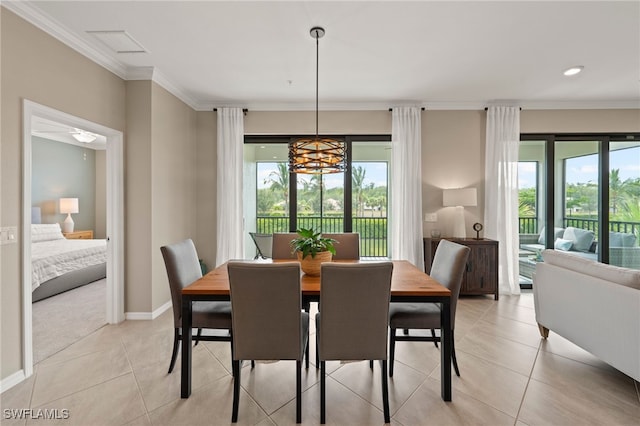 dining space featuring light tile patterned flooring, plenty of natural light, and a chandelier