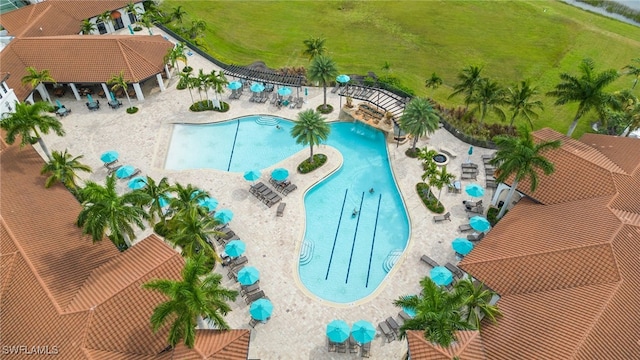 view of swimming pool with a patio