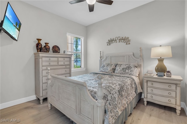 bedroom featuring light wood-type flooring and ceiling fan