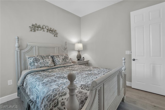 bedroom featuring hardwood / wood-style flooring