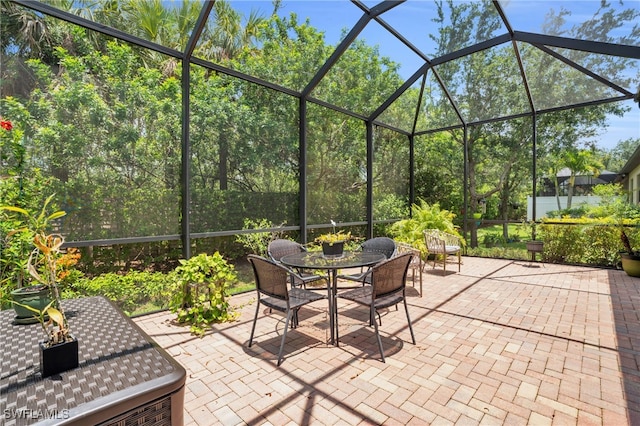 view of patio with a lanai