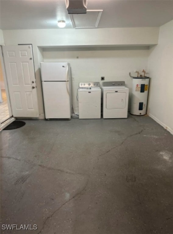 clothes washing area with washer and clothes dryer and electric water heater