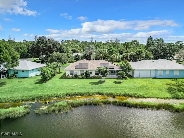 drone / aerial view with a water view