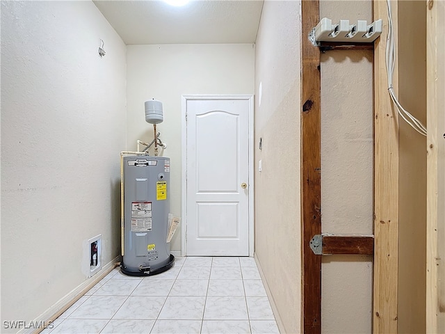 utility room featuring water heater