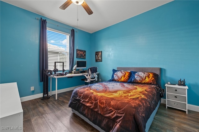 bedroom with ceiling fan and dark wood-type flooring