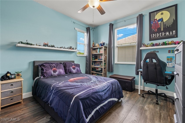 bedroom with ceiling fan and dark wood-type flooring