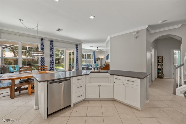 kitchen with dishwasher, ornamental molding, sink, white cabinets, and light tile patterned floors