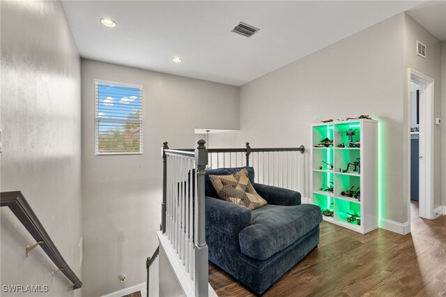 living area featuring hardwood / wood-style flooring