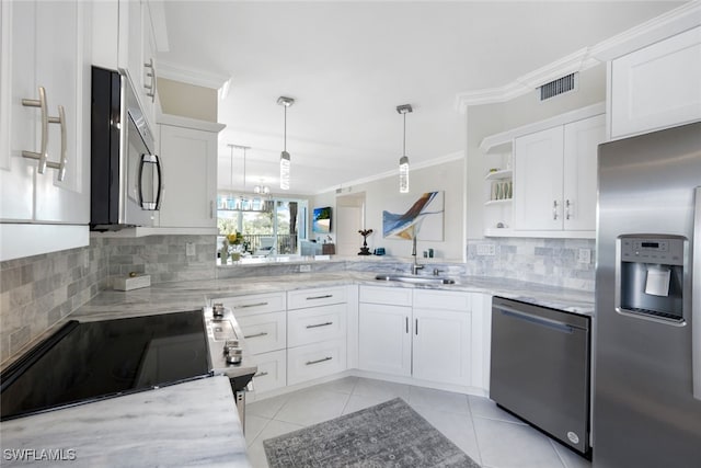 kitchen featuring white cabinetry, appliances with stainless steel finishes, and open shelves