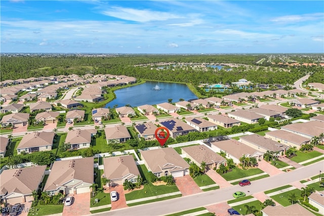 aerial view featuring a residential view and a water view