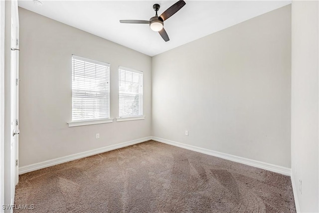 unfurnished room featuring ceiling fan, carpet, and baseboards